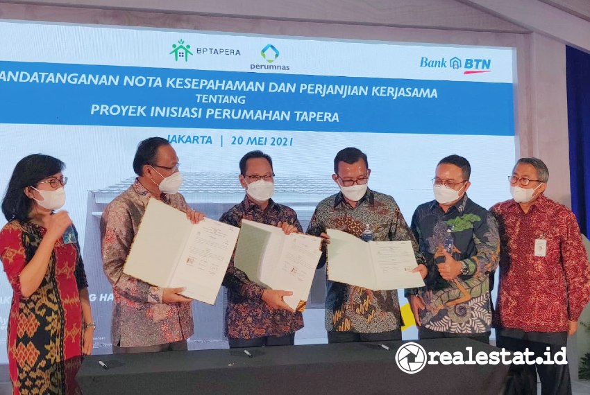 Penandatanganan Nota Kesepahaman antara BP Tapera, Bank BTN, dan Perum Perumnas tentang Proyek Inisiasi Penyaluran Pembiayaan Tabungan Perumahan Rakyat, di Jakarta, Kamis, 20 Mei 2021 - (Foto: Dok. Bank BTN).